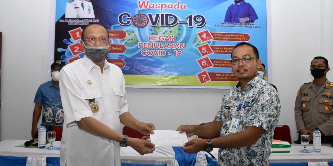 Bupati Natuna Salurkan Bantuan Pangan, Rapid Test dan APD Kepada Masyarakat Bunguran Batubi