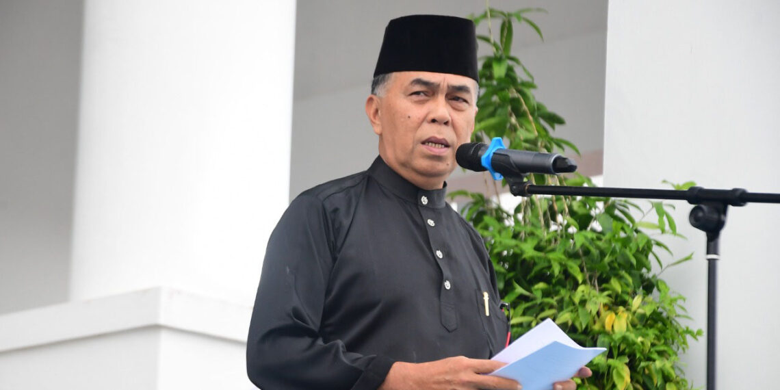 Bupati Wan Siswandi Pimpin Upacara HUT Dishub ke 77 dan HUT Kepri ke 20 Dalam Rintikan Hujan