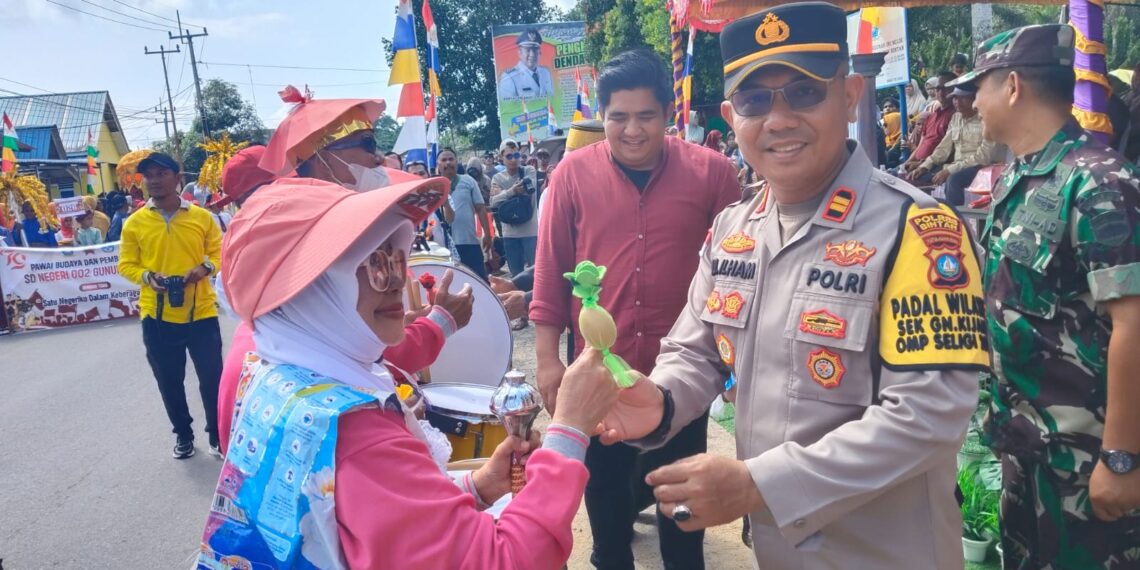 Polres Bintan Kawal Pawai Budaya dan Pembangunan Kecamatan Gunung Kijang dengan Aman dan Lancar