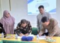 Penandatangan perjanjian kerja sama antara STAI Natuna, Dr H Umar Natuna M.Pd.I dengan Lembaga Penjamin Mutu UIN Suska Riau, Zarkasih, S.Ag., M.Ag., Ph.D