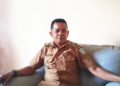 Kepala Desa Kuala Maras saat diruang kerjanya saat di konfirmasi Wartawan Senin,(29/6/2026)