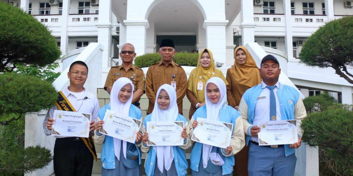 Pj. Sekda Karimun Gaungkan Kampanye BERLIAN di Peringatan HAN ke-42