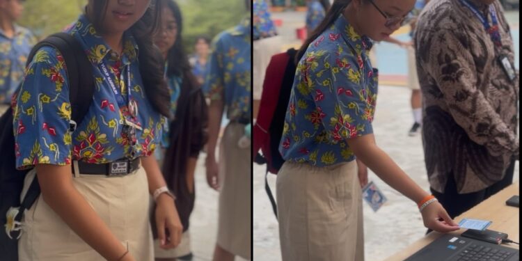 Siswa Siswi SMP Swasta Santo Yusup Karimun sedang mempraktekkan Absensi Chip RFID