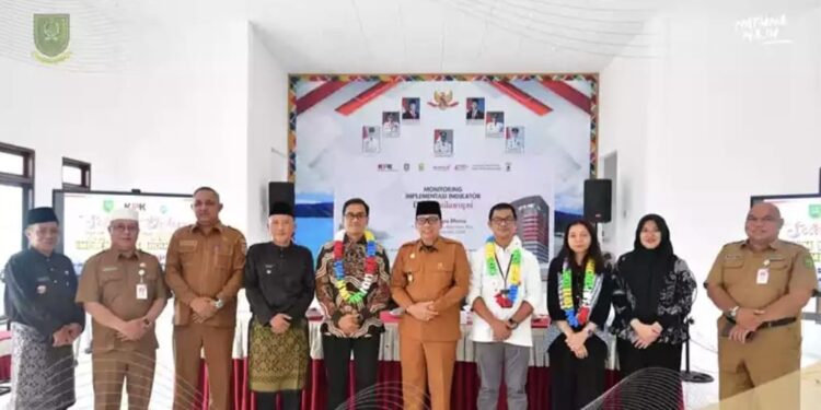 Wakil Bupati Natuna, Jarmin, SE, saat menghadiri kegiatan Desa Antikorupsi yang dihadiri oleh Wakasatgas KPK RI Aris Dedi Arham beserta rombongan di Gedung Pertemuan Desa Limau Manis, Kecamatan Bunguran Timur Laut, Kabupaten Natuna.