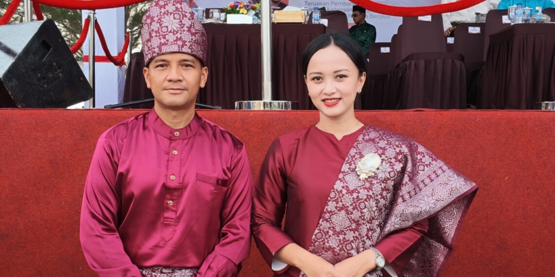 Danyon Komposit 1/Gardapati, Letkol Inf Reymond Hermawan Sitanggang, S.Sos., bersama istri, Ny. Oktavilani Reymond Hermawan Sitanggang